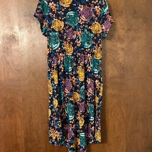Comfy LuLaRoe Girls Dress with Tiger Floral Patterns and Pockets